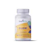 Bari Life Hair Growth Support Capsules on a wooden table