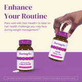 BariMelts Quick-Glide Calcium Supplement caplets in a hand