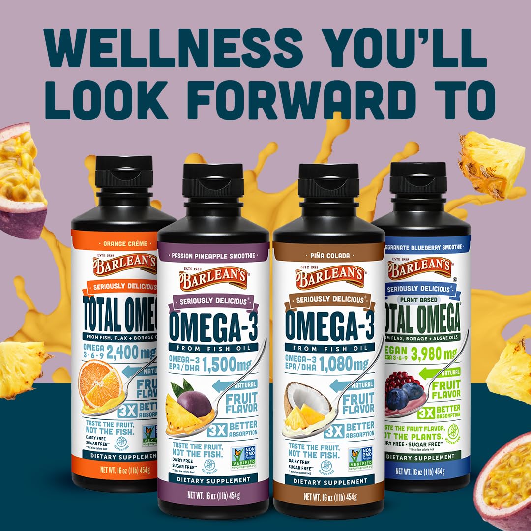 Barlean's Omega 3 Fish Oil Liquid in a glass with fruit
