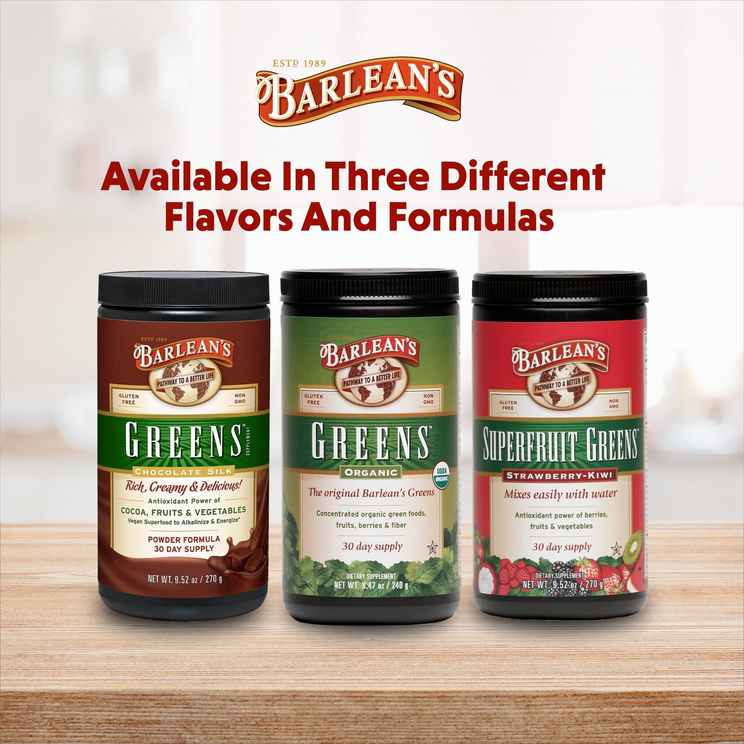 Barlean's Organic Greens Powder in a glass of water