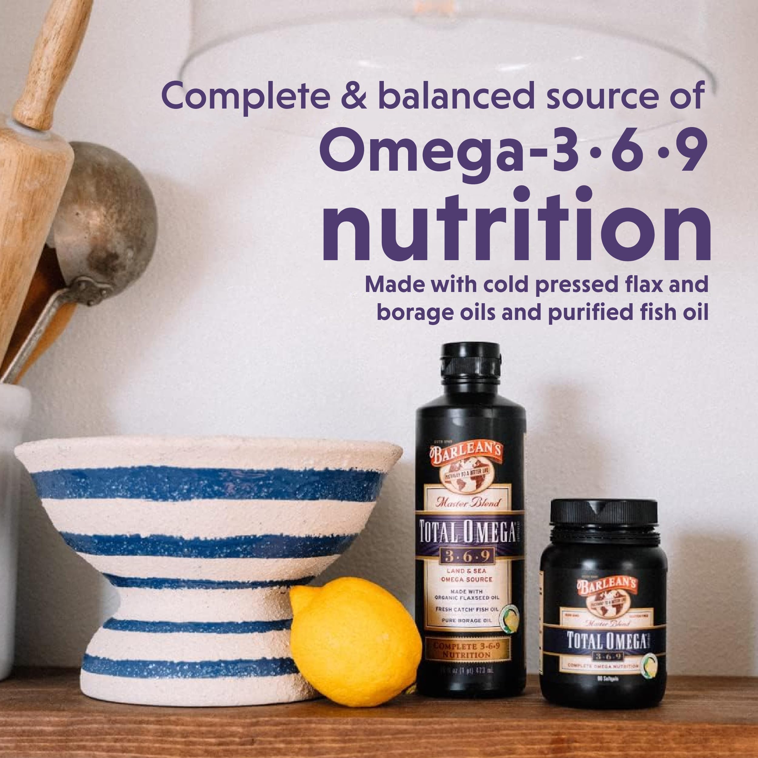 Barlean's Total Omega Softgels with fresh lemon slices