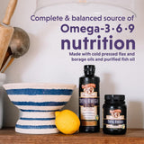 Barlean's Total Omega Softgels with fresh lemon slices