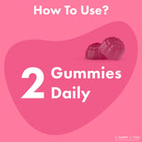 Be Happy Be You Biotin Gummies on a wooden table with a plant