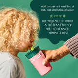Beam Kids Multivitamin with Greens mixed in a glass of water
