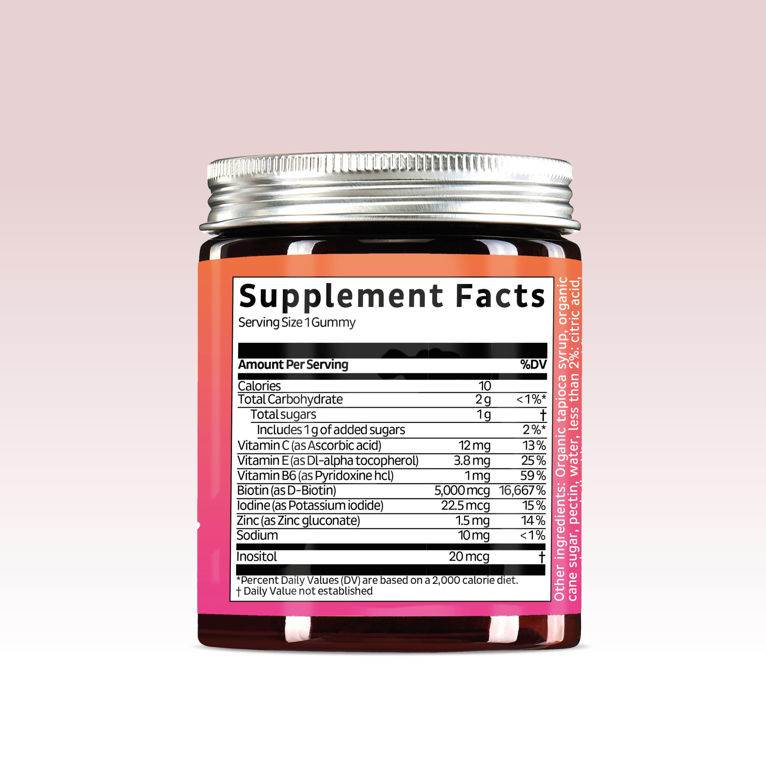 Bears with Benefits Biotin Gummies bottle on a wooden table