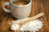 Beleon MCT Oil Powder displayed with coconut and coffee