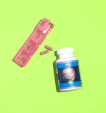 Bella All Natural Liver Extract Supplement in an open bottle with capsules