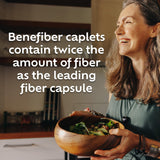 Benefiber Prebiotic Fiber Supplement Caplets with a glass of water