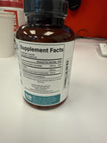 Benevolent Nourishment Hyaluronic Acid Supplement capsules on a wooden surface