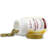BeShiny Vitamin C capsules on a wooden table