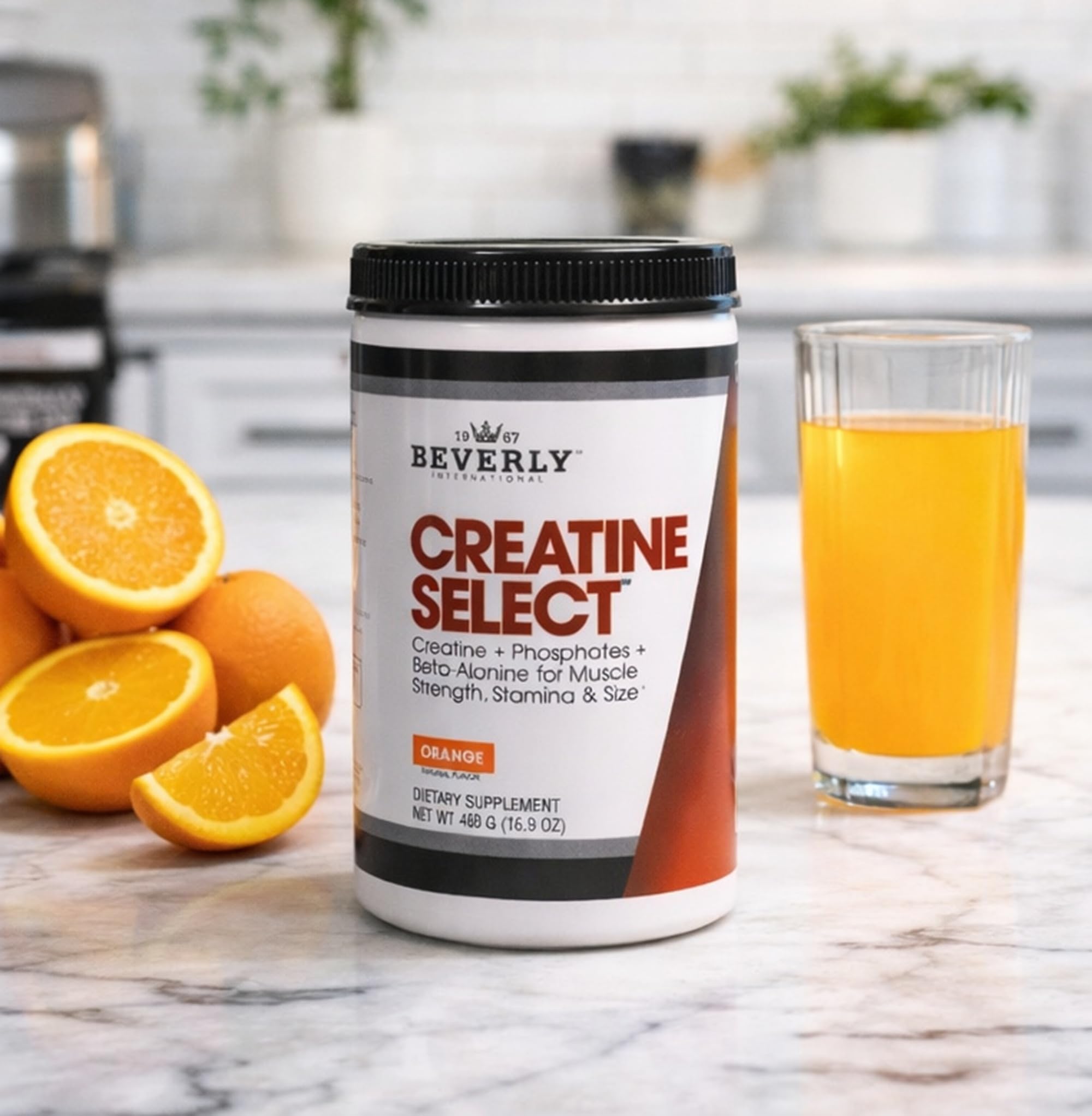 Beverly International Creatine Select 480g displayed with fitness equipment