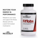 Beverly International FitTabs Multivitamins on a wooden table