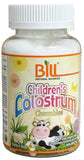 Bill Natural Sources Children's Colostrum Chewable Tablets with a measuring spoon