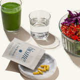 Bio.me Gut Remedy Capsules with water glass