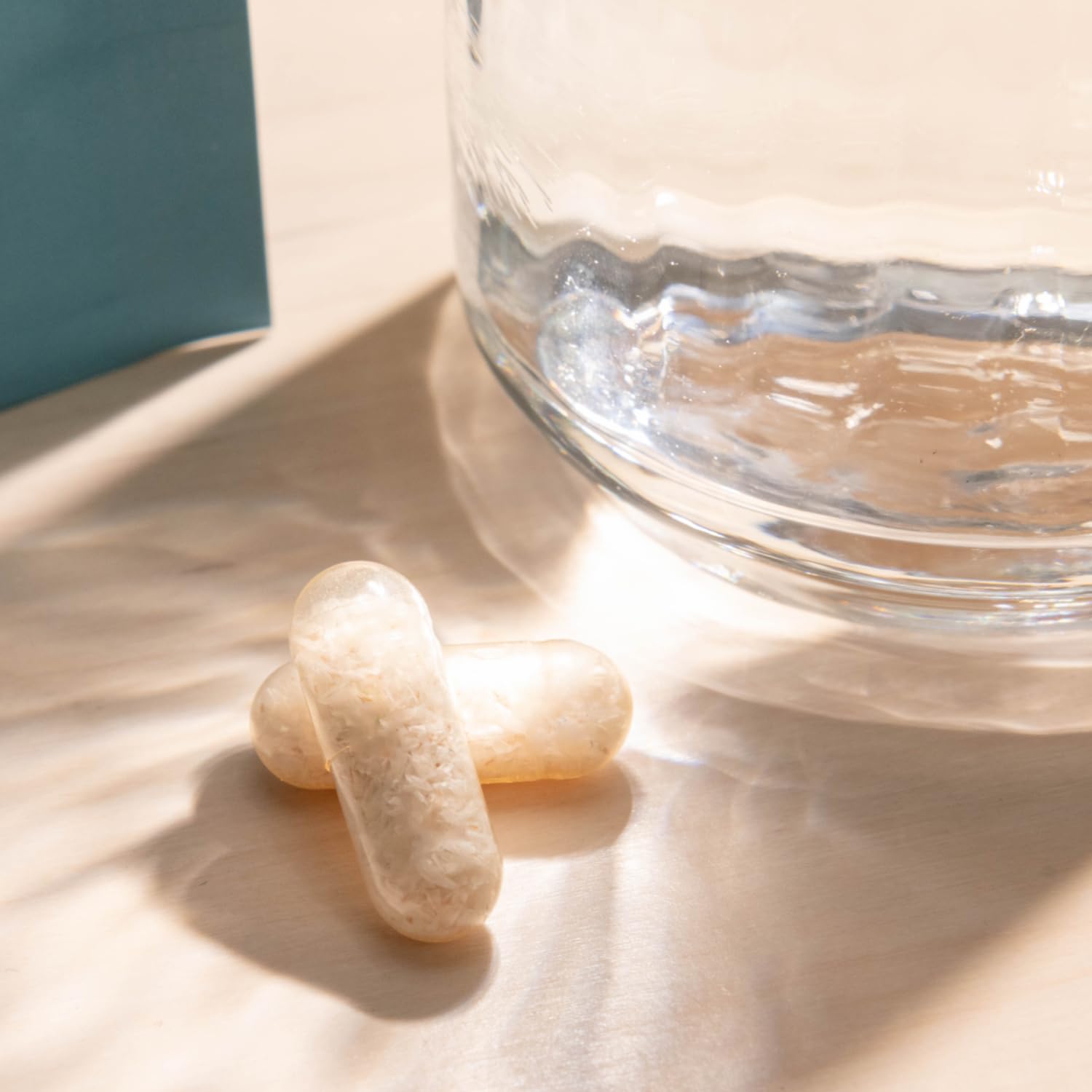 Bio.me Psyllium Husk Capsules with a measuring spoon