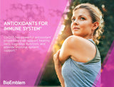 BioEmblem CoQ10 100mg softgels in a hand