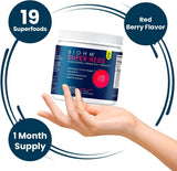 BIOHM Super Reds Powder alongside fresh fruits
