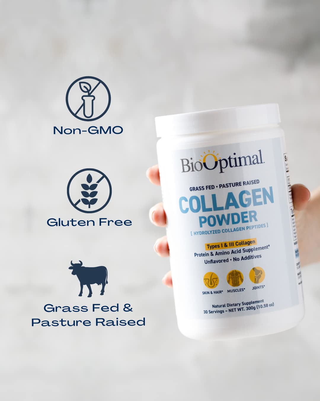 BioOptimal Collagen Peptide Powder 340g in a glass of water