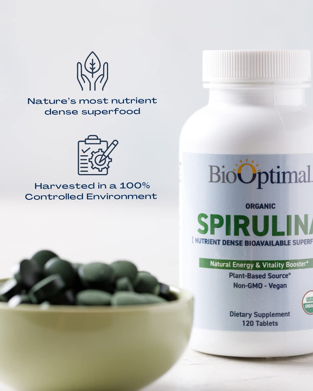 BioOptimal Spirulina Tablets with a measuring scoop