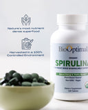 BioOptimal Spirulina Tablets with a measuring scoop