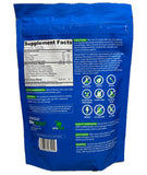 BioTrust Eternal Reds Superfood Powder in a glass of water
