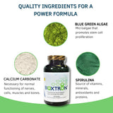 Bioxtron Spirulina Capsules on a wooden table with a glass of water