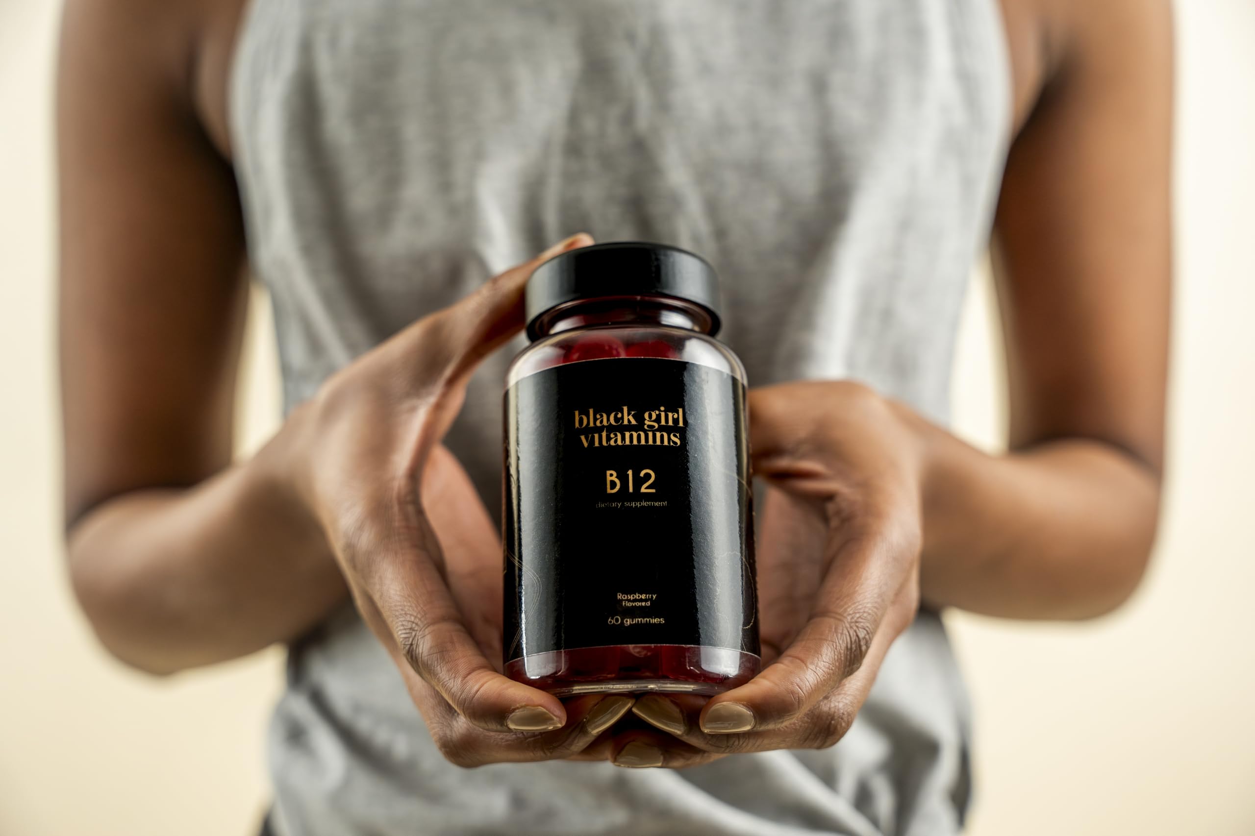 Black Girl Vitamins B12 Gummies with fresh raspberries