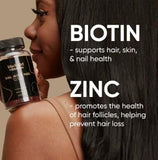 Black Girl Vitamins Biotin Gummies on a wooden table