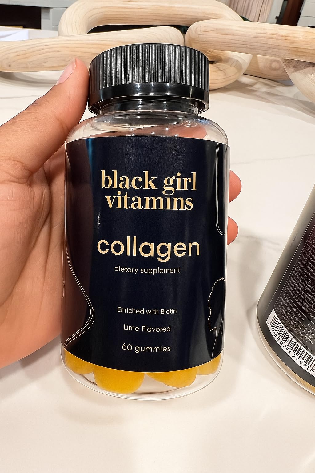 Black Girl Vitamins Collagen Gummies in a bowl with lime slices