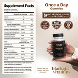 Black Girl Vitamins Multivitamin Gummies with a hand holding one gummy