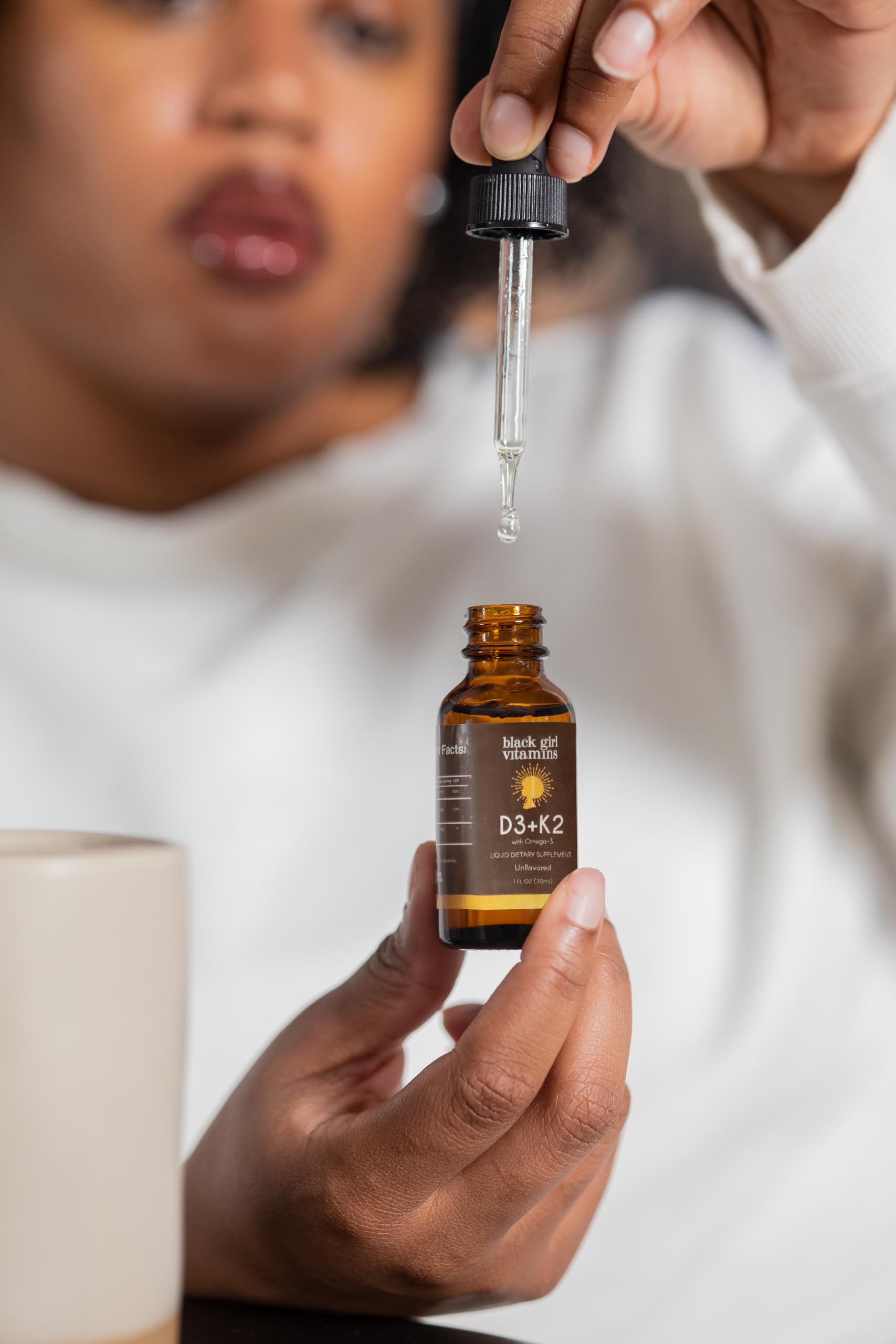 Black Girl Vitamins Vitamin D3 K2 Drops 82g lifestyle scene