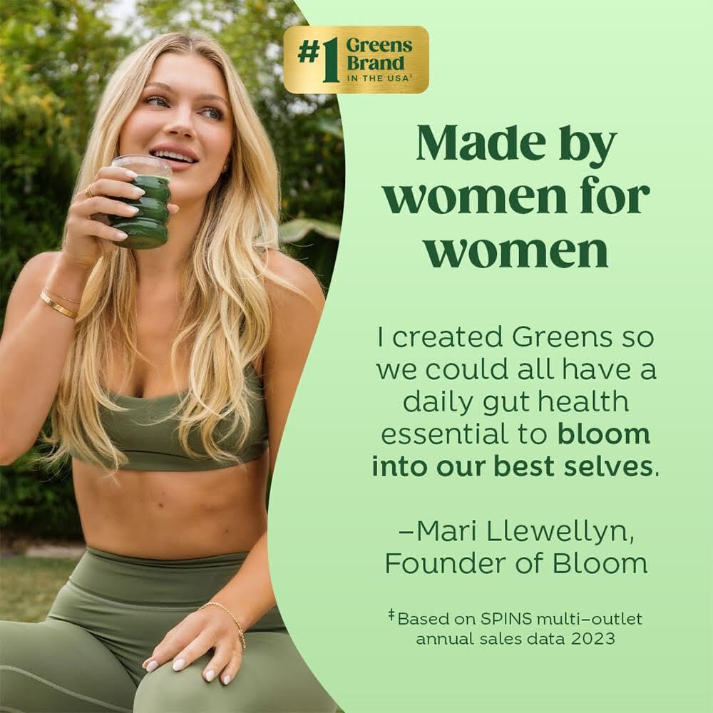 Bloom Nutrition Greens & Superfoods Powder displayed with fresh fruits