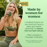 Bloom Nutrition Greens & Superfoods Powder displayed with fresh fruits