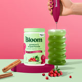 Bloom Nutrition Greens & Superfoods Powder spiced cranberry flavour scoop