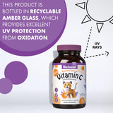 BlueBonnet Rainforest Animalz Vitamin C 250mg tablets in a child's hand
