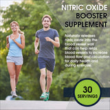 BlueEarth Company L-Arginine Drink Mix 5000mg powder in a glass of water