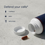 Blueprint Bryan Johnson Essential Softgels vegan capsules on a wooden table