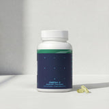 Blueprint Bryan Johnson Omega-3 Vegan Supplement on a wooden table
