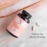 BLYSS Nutrition UNWIND Magnesium Glycinate 200mg capsules on a wooden surface