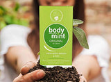 Body Mint Body Odour Pills with a glass of water
