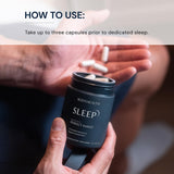 BodyHealth Sleep Aid Supplement capsules in a hand