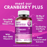 Bold Botanica Cranberry Supplement capsules on a wooden surface