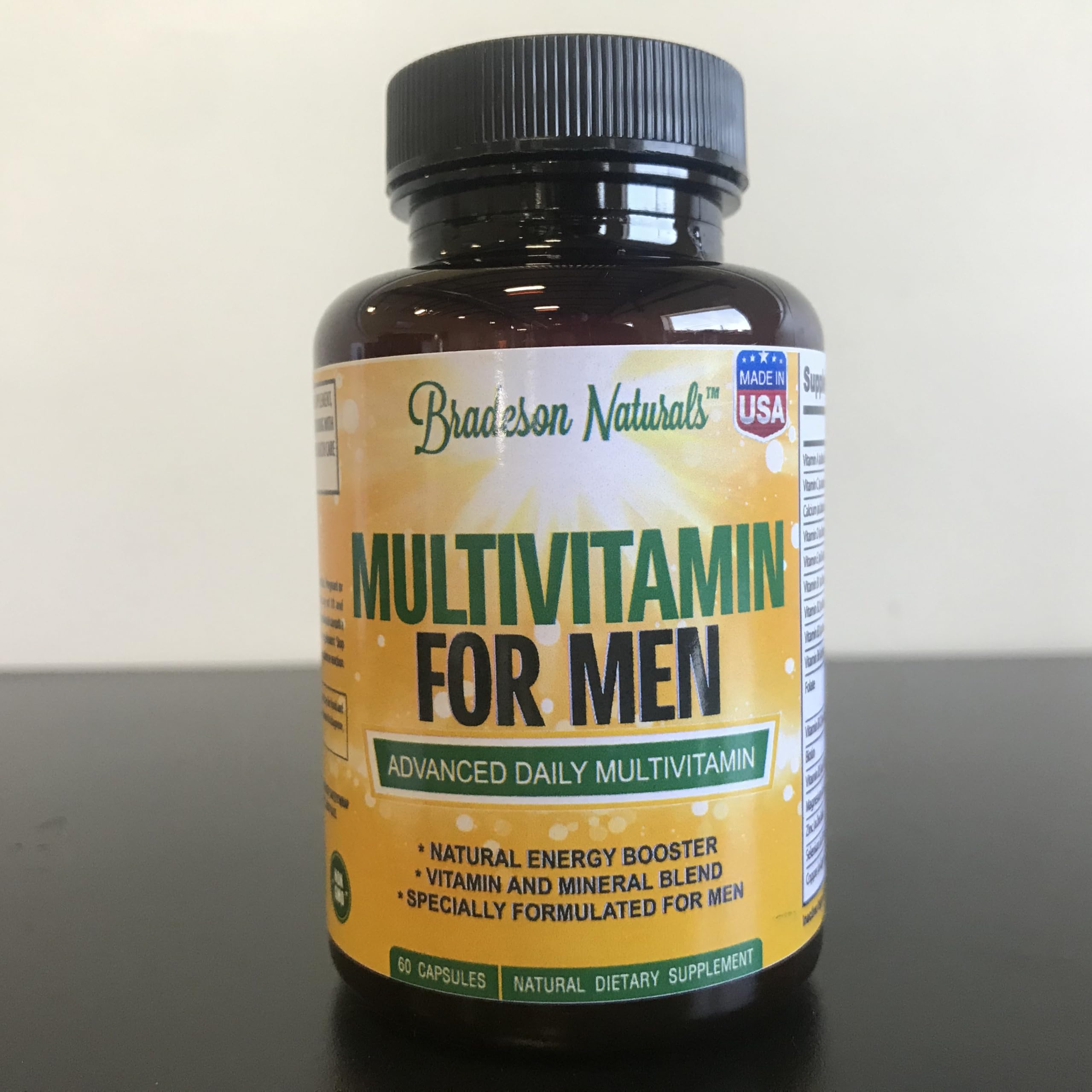 Bradeson Naturals Multivitamins for Men with a measuring spoon