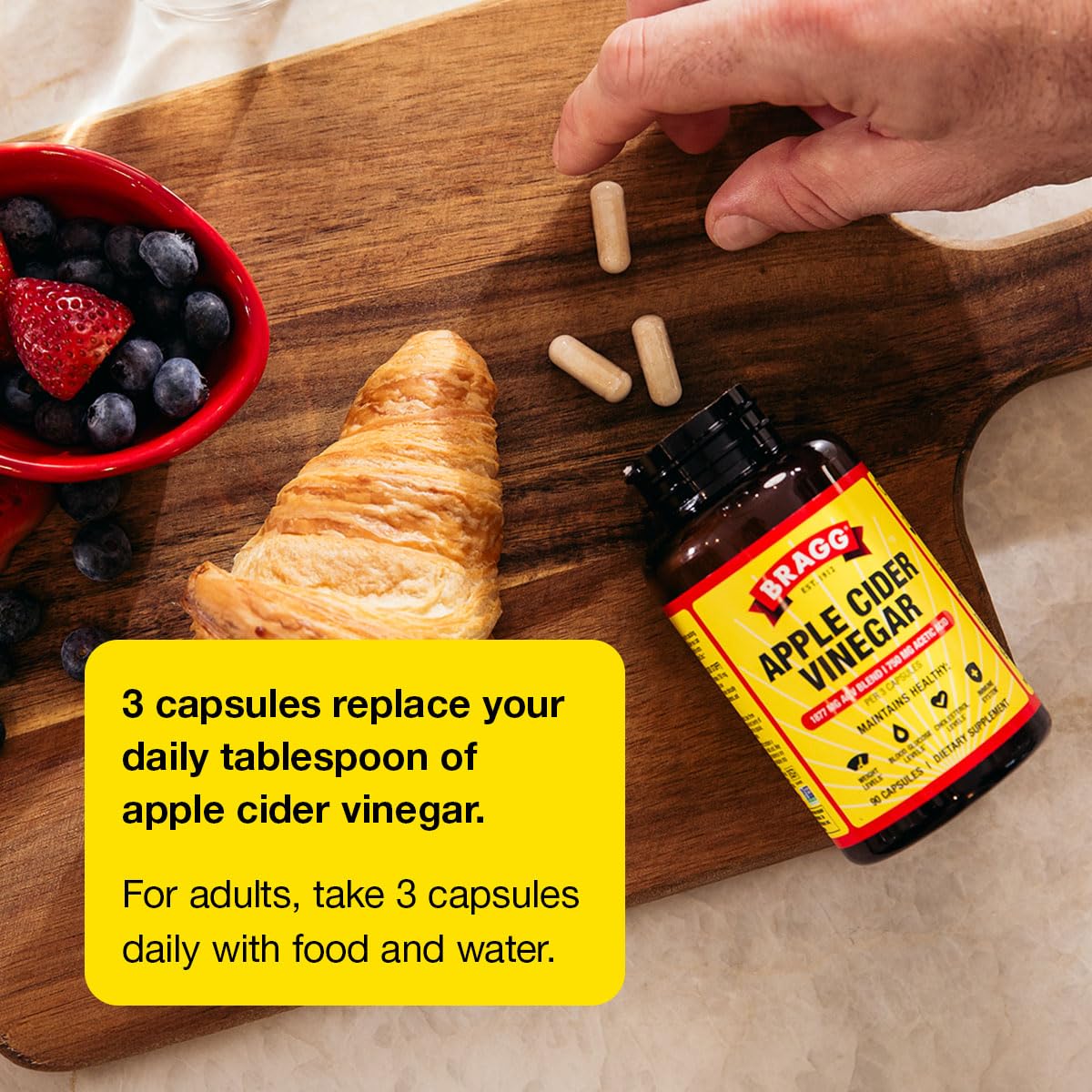 Bragg ACV Capsules 100g lifestyle scene with water