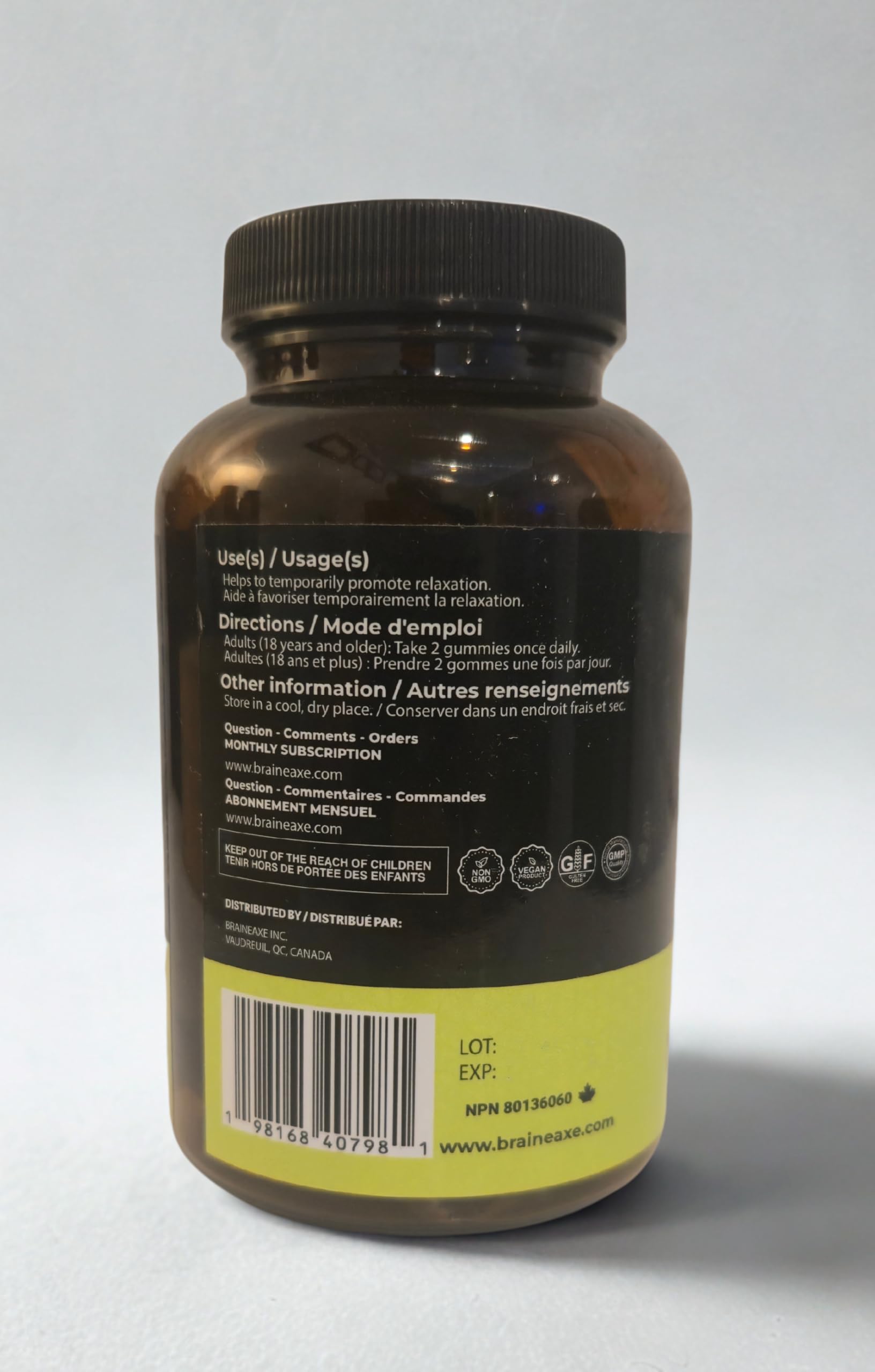 BRAINEAXE daily wellness Gummies with ingredients on display