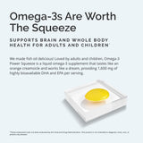 BRAINMD Omega-3 Fish Oil Liquid 540g pouring into a spoon