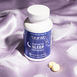 BrainMD Put Me to Sleep Naturally on a bedside table