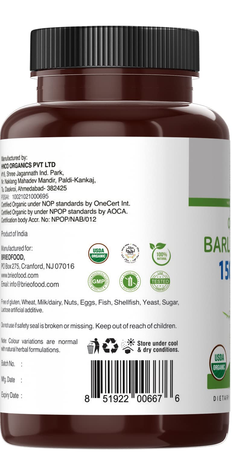 Brieofood Organic Barley Grass tablets in a hand