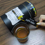BRILLURE Shilajit Honey Stick with ingredients on a table