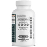Bronson Melatonin 1MG Vegetarian Tablets on a wooden table
